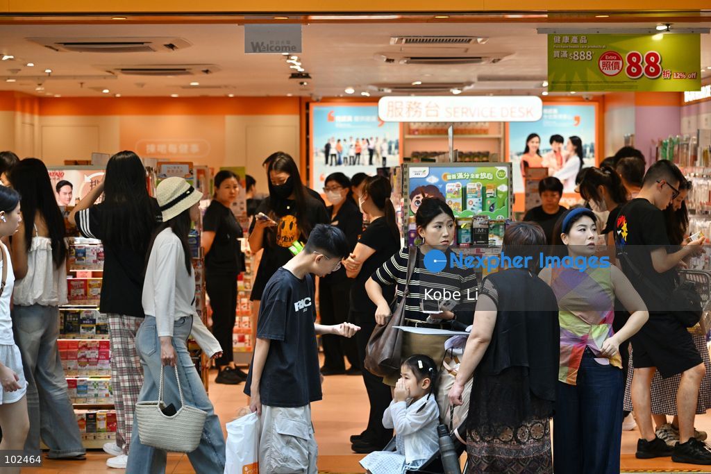 Chinese tourists shopping in a shop at Tsim Sha Tsui on October 1, 2026 in Hong Kong. Today is the first day of China's National Day holiday. (Photo by Kobe Li/Nexpher Images)