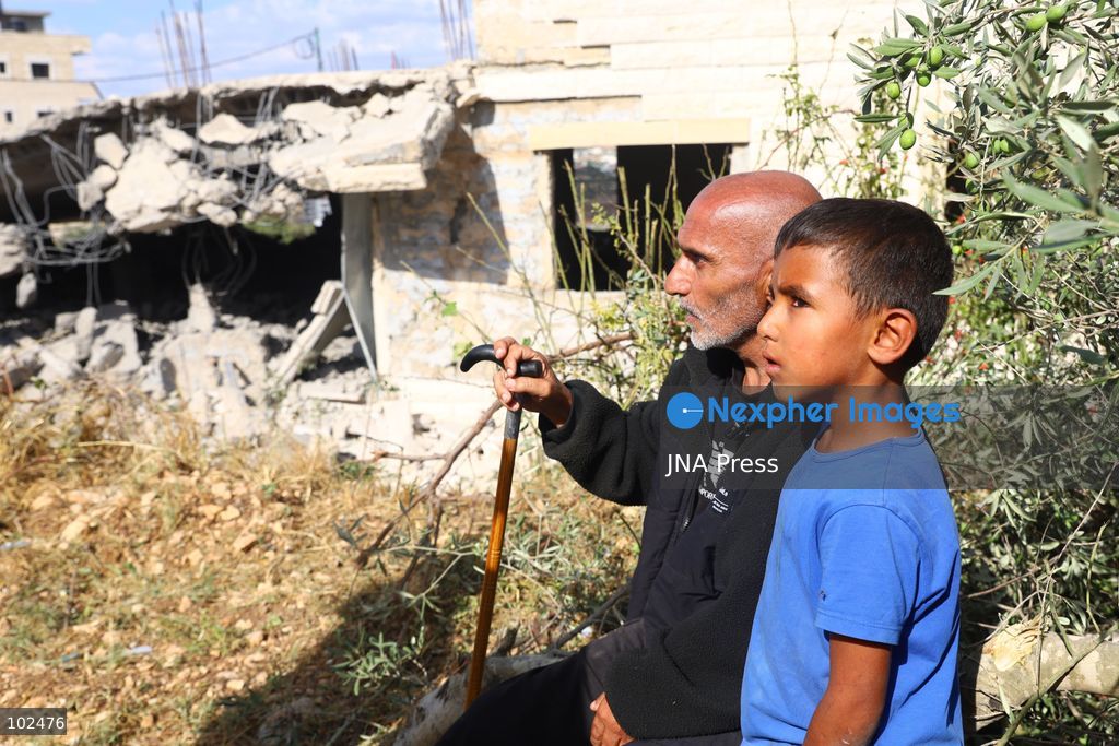 BIDDU, OCCUPIED WEST BANK, OCTOBER 7, 2026: Israeli forces accompanied by military bulldozers and engineering units demolish the home of Palestinian prisoner Qadri Samara in Biddu, northwest of Jerusalem. Israeli forces evacuated the house and surrounding homes before demolishing parts of the building and destroying it with controlled explosions. Israeli authorities accuse Samara of carrying out a shooting attack near the Israeli settlement of Neve Tzuf, also known as Halamish, in which an Israeli was killed. The demolition took place during a wider Israeli military operation involving raids, arrests and movement restrictions in several Palestinian towns and villages northwest of Jerusalem. Photo by Salman Mohsen Alkhatib / JNA Press. (Photo by Salman Mohsen Alkhatib/JNA Press via Nexpher Images)