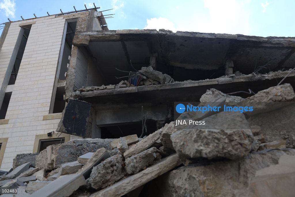 BIDDU, OCCUPIED WEST BANK, OCTOBER 7, 2026: Israeli forces accompanied by military bulldozers and engineering units demolish the home of Palestinian prisoner Qadri Samara in Biddu, northwest of Jerusalem. Israeli forces evacuated the house and surrounding homes before demolishing parts of the building and destroying it with controlled explosions. Israeli authorities accuse Samara of carrying out a shooting attack near the Israeli settlement of Neve Tzuf, also known as Halamish, in which an Israeli was killed. The demolition took place during a wider Israeli military operation involving raids, arrests and movement restrictions in several Palestinian towns and villages northwest of Jerusalem. Photo by Salman Mohsen Alkhatib / JNA Press. (Photo by Salman Mohsen Alkhatib/JNA Press via Nexpher Images)