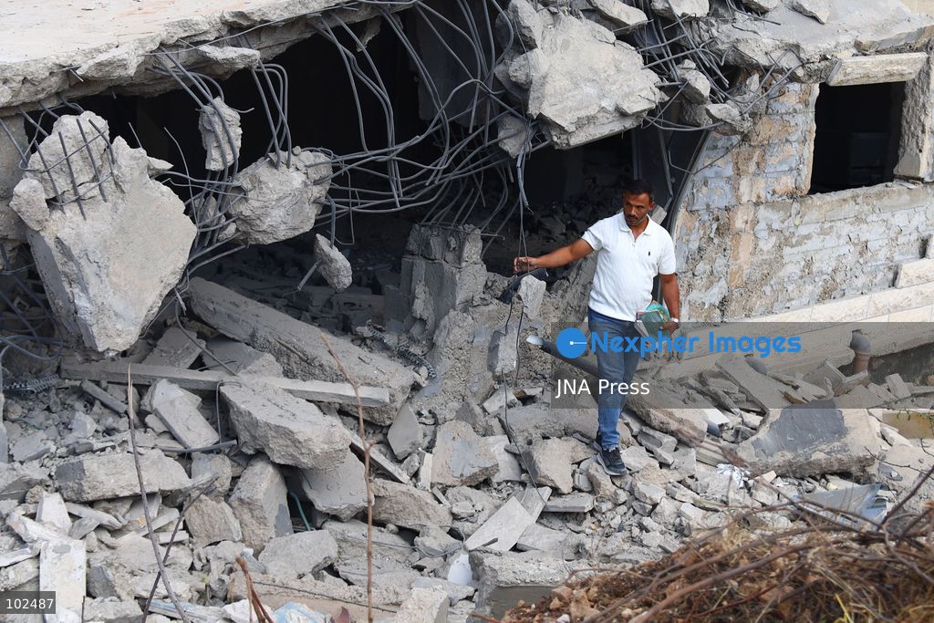 BIDDU, OCCUPIED WEST BANK, OCTOBER 7, 2026: Israeli forces accompanied by military bulldozers and engineering units demolish the home of Palestinian prisoner Qadri Samara in Biddu, northwest of Jerusalem. Israeli forces evacuated the house and surrounding homes before demolishing parts of the building and destroying it with controlled explosions. Israeli authorities accuse Samara of carrying out a shooting attack near the Israeli settlement of Neve Tzuf, also known as Halamish, in which an Israeli was killed. The demolition took place during a wider Israeli military operation involving raids, arrests and movement restrictions in several Palestinian towns and villages northwest of Jerusalem. Photo by Salman Mohsen Alkhatib / JNA Press. (Photo by Salman Mohsen Alkhatib/JNA Press via Nexpher Images)