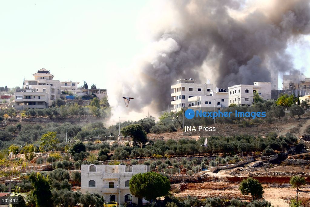 BIDDU, OCCUPIED WEST BANK, OCTOBER 7, 2026: Israeli forces accompanied by military bulldozers and engineering units demolish the home of Palestinian prisoner Qadri Samara in Biddu, northwest of Jerusalem. Israeli forces evacuated the house and surrounding homes before demolishing parts of the building and destroying it with controlled explosions. Israeli authorities accuse Samara of carrying out a shooting attack near the Israeli settlement of Neve Tzuf, also known as Halamish, in which an Israeli was killed. The demolition took place during a wider Israeli military operation involving raids, arrests and movement restrictions in several Palestinian towns and villages northwest of Jerusalem. Photo by Salman Mohsen Alkhatib / JNA Press. (Photo by Salman Mohsen Alkhatib/JNA Press via Nexpher Images)
