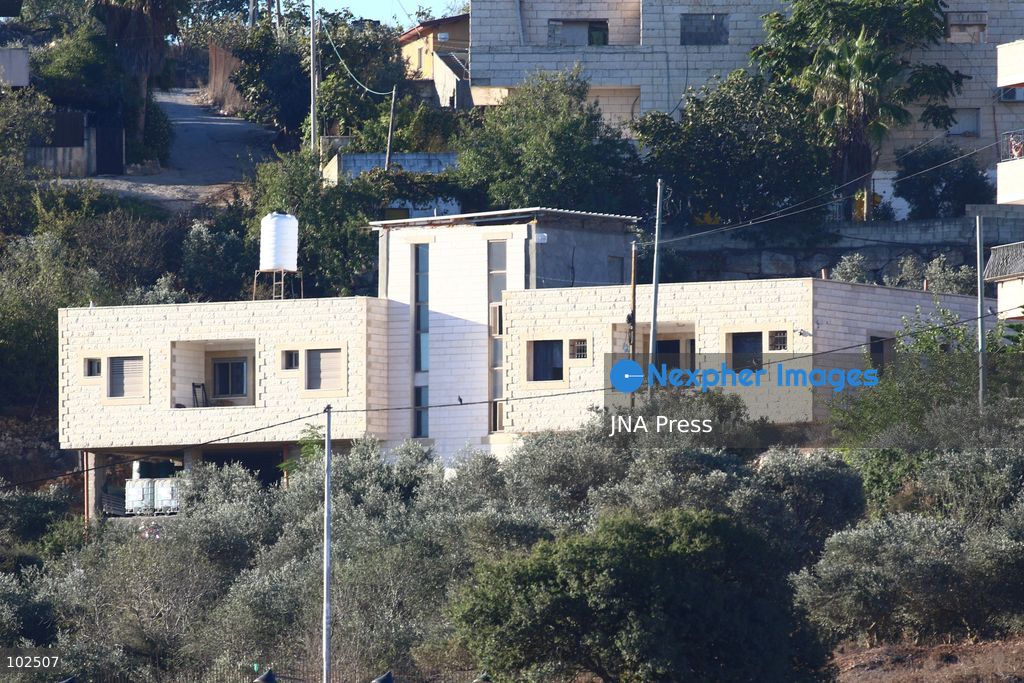 BIDDU, OCCUPIED WEST BANK, OCTOBER 7, 2026: Israeli forces accompanied by military bulldozers and engineering units demolish the home of Palestinian prisoner Qadri Samara in Biddu, northwest of Jerusalem. Israeli forces evacuated the house and surrounding homes before demolishing parts of the building and destroying it with controlled explosions. Israeli authorities accuse Samara of carrying out a shooting attack near the Israeli settlement of Neve Tzuf, also known as Halamish, in which an Israeli was killed. The demolition took place during a wider Israeli military operation involving raids, arrests and movement restrictions in several Palestinian towns and villages northwest of Jerusalem. Photo by Salman Mohsen Alkhatib / JNA Press. (Photo by Salman Mohsen Alkhatib/JNA Press via Nexpher Images)