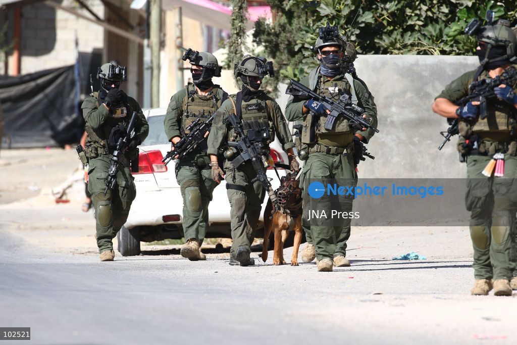 QATANNA, OCCUPIED WEST BANK, OCTOBER 7, 2026: Israeli forces carry out a military operation in the town of Qatanna, northwest of Jerusalem, raiding residential homes, detaining Palestinian residents and conducting field interrogations. Israeli forces also imposed a closure on the town, restricting movement in and out of the area. The operation in Qatanna formed part of a wider campaign across towns and villages northwest of Jerusalem, during which around 50 Palestinians were detained or arrested and dozens of homes were raided, according to Palestinian officials. Photo by Salman Mohsen Alkhatib / JNA Press. (Photo by Salman Mohsen Alkhatib/JNA Press via Nexpher Images)