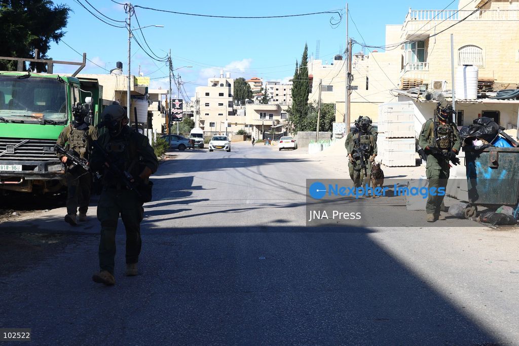 QATANNA, OCCUPIED WEST BANK, OCTOBER 7, 2026: Israeli forces carry out a military operation in the town of Qatanna, northwest of Jerusalem, raiding residential homes, detaining Palestinian residents and conducting field interrogations. Israeli forces also imposed a closure on the town, restricting movement in and out of the area. The operation in Qatanna formed part of a wider campaign across towns and villages northwest of Jerusalem, during which around 50 Palestinians were detained or arrested and dozens of homes were raided, according to Palestinian officials. Photo by Salman Mohsen Alkhatib / JNA Press. (Photo by Salman Mohsen Alkhatib/JNA Press via Nexpher Images)