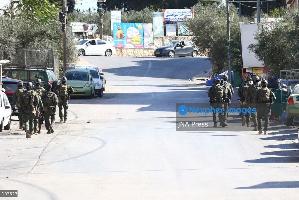 QATANNA, OCCUPIED WEST BANK, OCTOBER 7, 2026: Israeli forces carry out a military operation in the town of Qatanna, northwest of Jerusalem, raiding residential homes, detaining Palestinian residents and conducting field interrogations. Israeli forces also imposed a closure on the town, restricting movement in and out of the area. The operation in Qatanna formed part of a wider campaign across towns and villages northwest of Jerusalem, during which around 50 Palestinians were detained or arrested and dozens of homes were raided, according to Palestinian officials. Photo by Salman Mohsen Alkhatib / JNA Press. (Photo by Salman Mohsen Alkhatib/JNA Press via Nexpher Images)