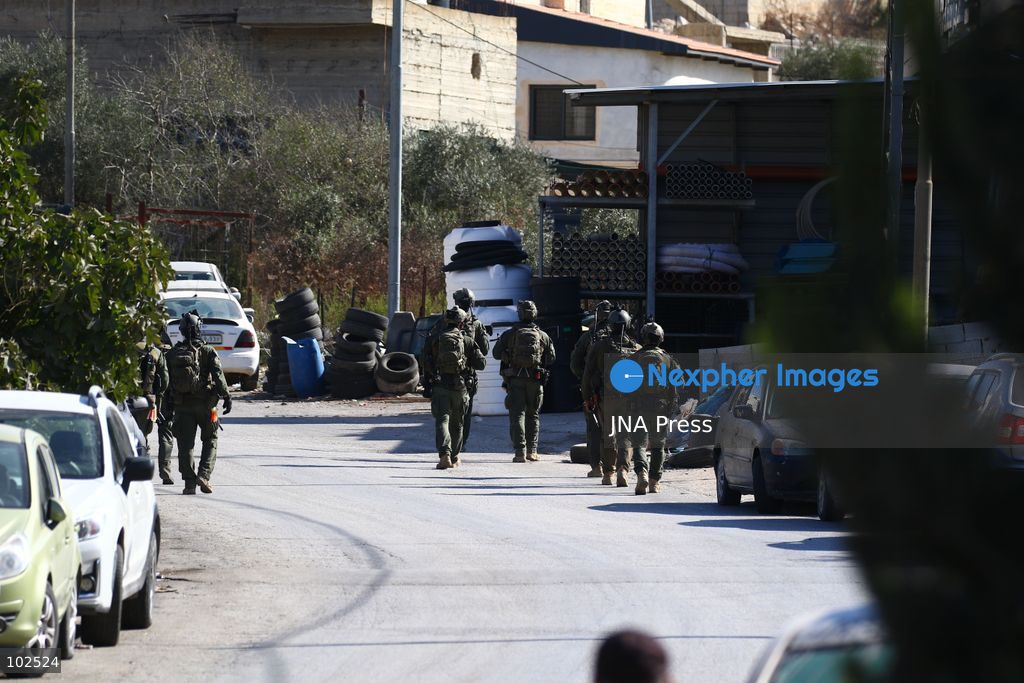 QATANNA, OCCUPIED WEST BANK, OCTOBER 7, 2026: Israeli forces carry out a military operation in the town of Qatanna, northwest of Jerusalem, raiding residential homes, detaining Palestinian residents and conducting field interrogations. Israeli forces also imposed a closure on the town, restricting movement in and out of the area. The operation in Qatanna formed part of a wider campaign across towns and villages northwest of Jerusalem, during which around 50 Palestinians were detained or arrested and dozens of homes were raided, according to Palestinian officials. Photo by Salman Mohsen Alkhatib / JNA Press. (Photo by Salman Mohsen Alkhatib/JNA Press via Nexpher Images)