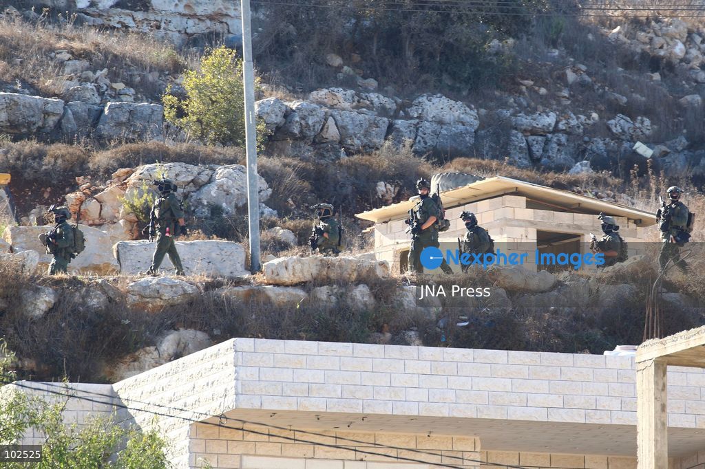 QATANNA, OCCUPIED WEST BANK, OCTOBER 7, 2026: Israeli forces carry out a military operation in the town of Qatanna, northwest of Jerusalem, raiding residential homes, detaining Palestinian residents and conducting field interrogations. Israeli forces also imposed a closure on the town, restricting movement in and out of the area. The operation in Qatanna formed part of a wider campaign across towns and villages northwest of Jerusalem, during which around 50 Palestinians were detained or arrested and dozens of homes were raided, according to Palestinian officials. Photo by Salman Mohsen Alkhatib / JNA Press. (Photo by Salman Mohsen Alkhatib/JNA Press via Nexpher Images)