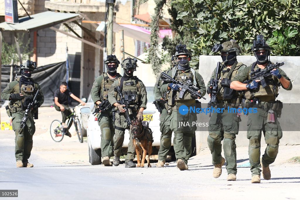 QATANNA, OCCUPIED WEST BANK, OCTOBER 7, 2026: Israeli forces carry out a military operation in the town of Qatanna, northwest of Jerusalem, raiding residential homes, detaining Palestinian residents and conducting field interrogations. Israeli forces also imposed a closure on the town, restricting movement in and out of the area. The operation in Qatanna formed part of a wider campaign across towns and villages northwest of Jerusalem, during which around 50 Palestinians were detained or arrested and dozens of homes were raided, according to Palestinian officials. Photo by Salman Mohsen Alkhatib / JNA Press. (Photo by Salman Mohsen Alkhatib/JNA Press via Nexpher Images)