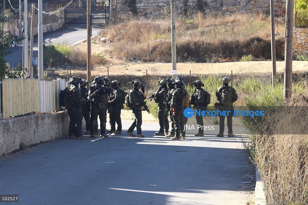 QATANNA, OCCUPIED WEST BANK, OCTOBER 7, 2026: Israeli forces carry out a military operation in the town of Qatanna, northwest of Jerusalem, raiding residential homes, detaining Palestinian residents and conducting field interrogations. Israeli forces also imposed a closure on the town, restricting movement in and out of the area. The operation in Qatanna formed part of a wider campaign across towns and villages northwest of Jerusalem, during which around 50 Palestinians were detained or arrested and dozens of homes were raided, according to Palestinian officials. Photo by Salman Mohsen Alkhatib / JNA Press. (Photo by Salman Mohsen Alkhatib/JNA Press via Nexpher Images)