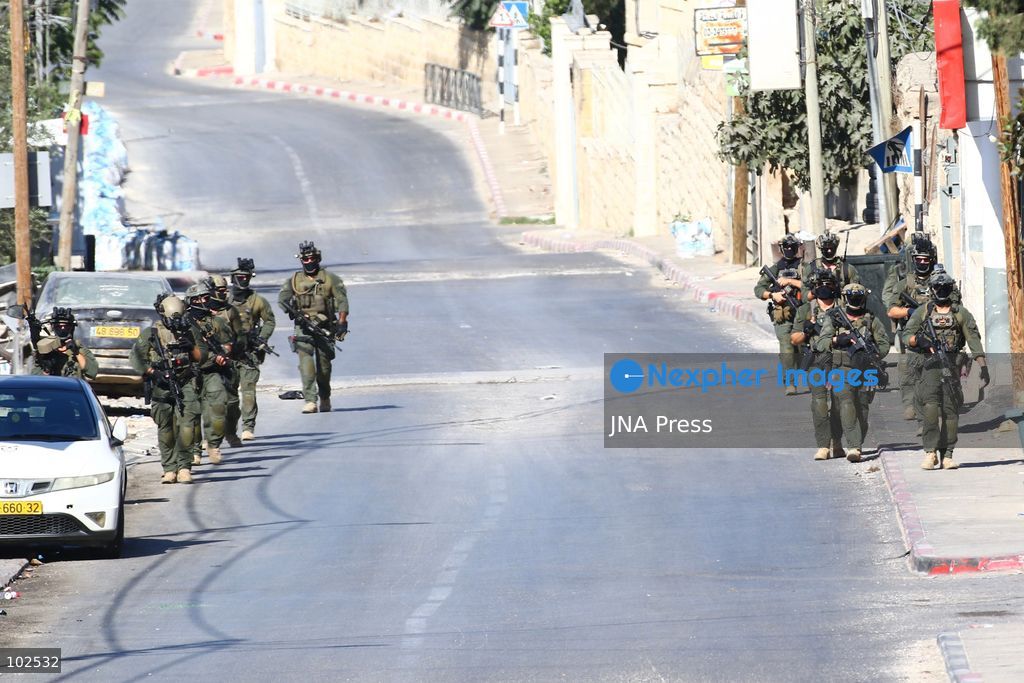 QATANNA, OCCUPIED WEST BANK, OCTOBER 7, 2026: Israeli forces carry out a military operation in the town of Qatanna, northwest of Jerusalem, raiding residential homes, detaining Palestinian residents and conducting field interrogations. Israeli forces also imposed a closure on the town, restricting movement in and out of the area. The operation in Qatanna formed part of a wider campaign across towns and villages northwest of Jerusalem, during which around 50 Palestinians were detained or arrested and dozens of homes were raided, according to Palestinian officials. Photo by Salman Mohsen Alkhatib / JNA Press. (Photo by Salman Mohsen Alkhatib/JNA Press via Nexpher Images)