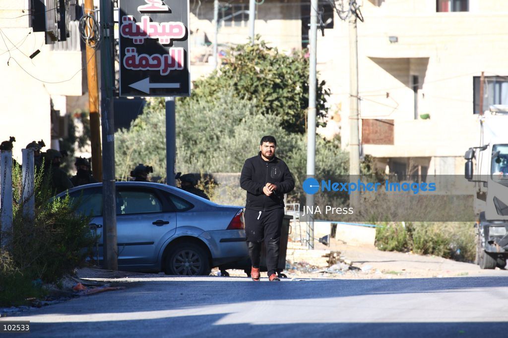 QATANNA, OCCUPIED WEST BANK, OCTOBER 7, 2026: Israeli forces carry out a military operation in the town of Qatanna, northwest of Jerusalem, raiding residential homes, detaining Palestinian residents and conducting field interrogations. Israeli forces also imposed a closure on the town, restricting movement in and out of the area. The operation in Qatanna formed part of a wider campaign across towns and villages northwest of Jerusalem, during which around 50 Palestinians were detained or arrested and dozens of homes were raided, according to Palestinian officials. Photo by Salman Mohsen Alkhatib / JNA Press. (Photo by Salman Mohsen Alkhatib/JNA Press via Nexpher Images)