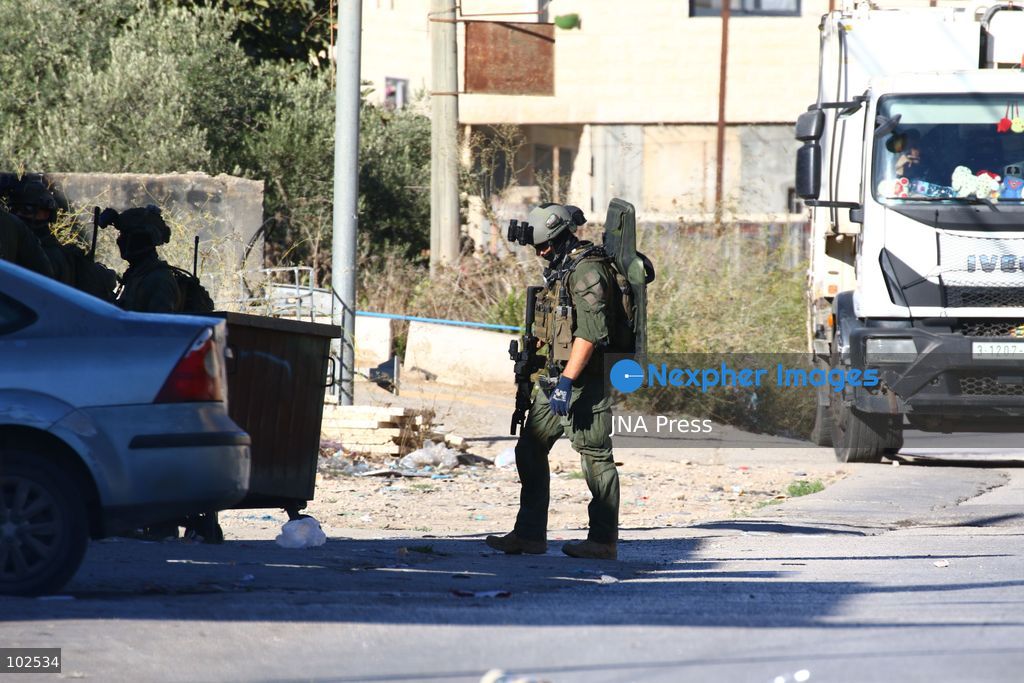 QATANNA, OCCUPIED WEST BANK, OCTOBER 7, 2026: Israeli forces carry out a military operation in the town of Qatanna, northwest of Jerusalem, raiding residential homes, detaining Palestinian residents and conducting field interrogations. Israeli forces also imposed a closure on the town, restricting movement in and out of the area. The operation in Qatanna formed part of a wider campaign across towns and villages northwest of Jerusalem, during which around 50 Palestinians were detained or arrested and dozens of homes were raided, according to Palestinian officials.  Photo by Salman Mohsen Alkhatib / JNA Press. (Photo by Salman Mohsen Alkhatib/JNA Press via Nexpher Images)