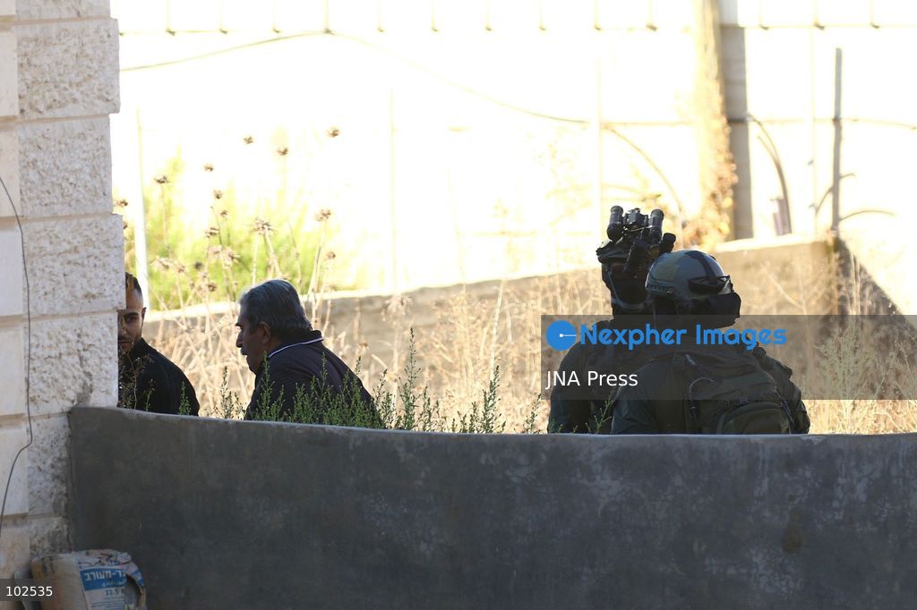 QATANNA, OCCUPIED WEST BANK, OCTOBER 7, 2026: Israeli forces carry out a military operation in the town of Qatanna, northwest of Jerusalem, raiding residential homes, detaining Palestinian residents and conducting field interrogations. Israeli forces also imposed a closure on the town, restricting movement in and out of the area. The operation in Qatanna formed part of a wider campaign across towns and villages northwest of Jerusalem, during which around 50 Palestinians were detained or arrested and dozens of homes were raided, according to Palestinian officials. Photo by Salman Mohsen Alkhatib / JNA Press. (Photo by Salman Mohsen Alkhatib/JNA Press via Nexpher Images)
