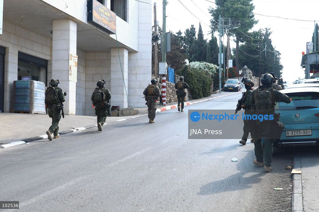 QATANNA, OCCUPIED WEST BANK, OCTOBER 7, 2026: Israeli forces carry out a military operation in the town of Qatanna, northwest of Jerusalem, raiding residential homes, detaining Palestinian residents and conducting field interrogations. Israeli forces also imposed a closure on the town, restricting movement in and out of the area. The operation in Qatanna formed part of a wider campaign across towns and villages northwest of Jerusalem, during which around 50 Palestinians were detained or arrested and dozens of homes were raided, according to Palestinian officials.  Photo by Salman Mohsen Alkhatib / JNA Press. (Photo by Salman Mohsen Alkhatib/JNA Press via Nexpher Images)