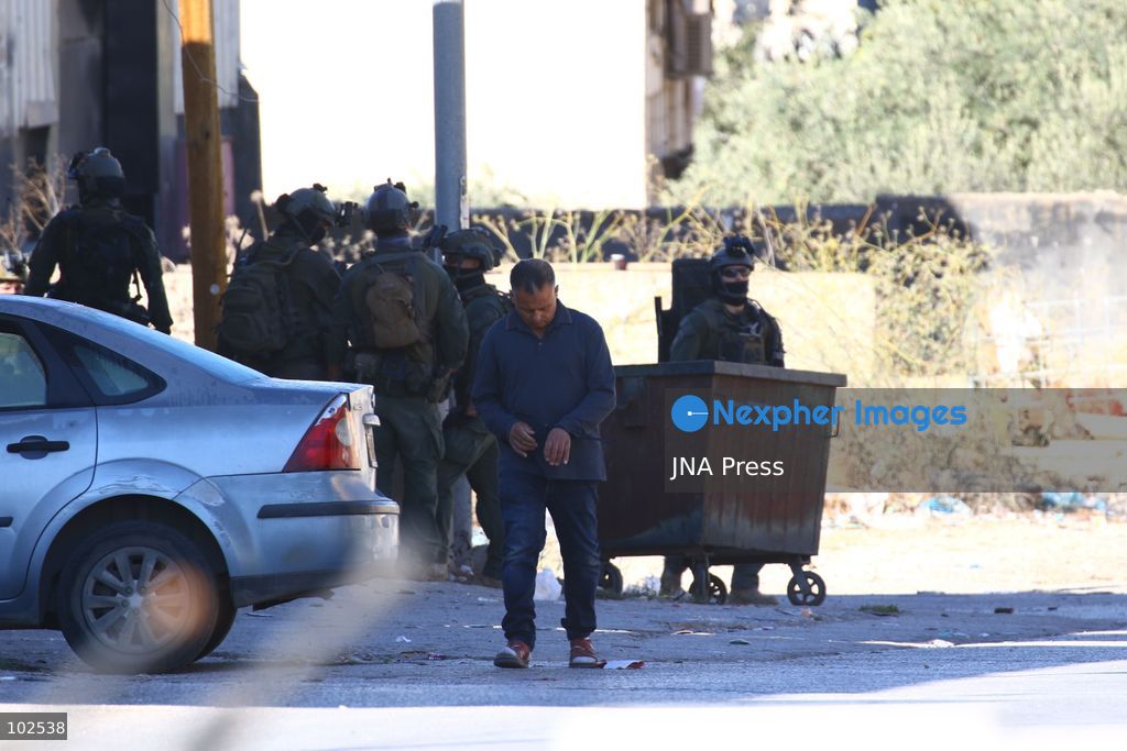 QATANNA, OCCUPIED WEST BANK, OCTOBER 7, 2026: Israeli forces carry out a military operation in the town of Qatanna, northwest of Jerusalem, raiding residential homes, detaining Palestinian residents and conducting field interrogations. Israeli forces also imposed a closure on the town, restricting movement in and out of the area. The operation in Qatanna formed part of a wider campaign across towns and villages northwest of Jerusalem, during which around 50 Palestinians were detained or arrested and dozens of homes were raided, according to Palestinian officials. Photo by Salman Mohsen Alkhatib / JNA Press. (Photo by Salman Mohsen Alkhatib/JNA Press via Nexpher Images)