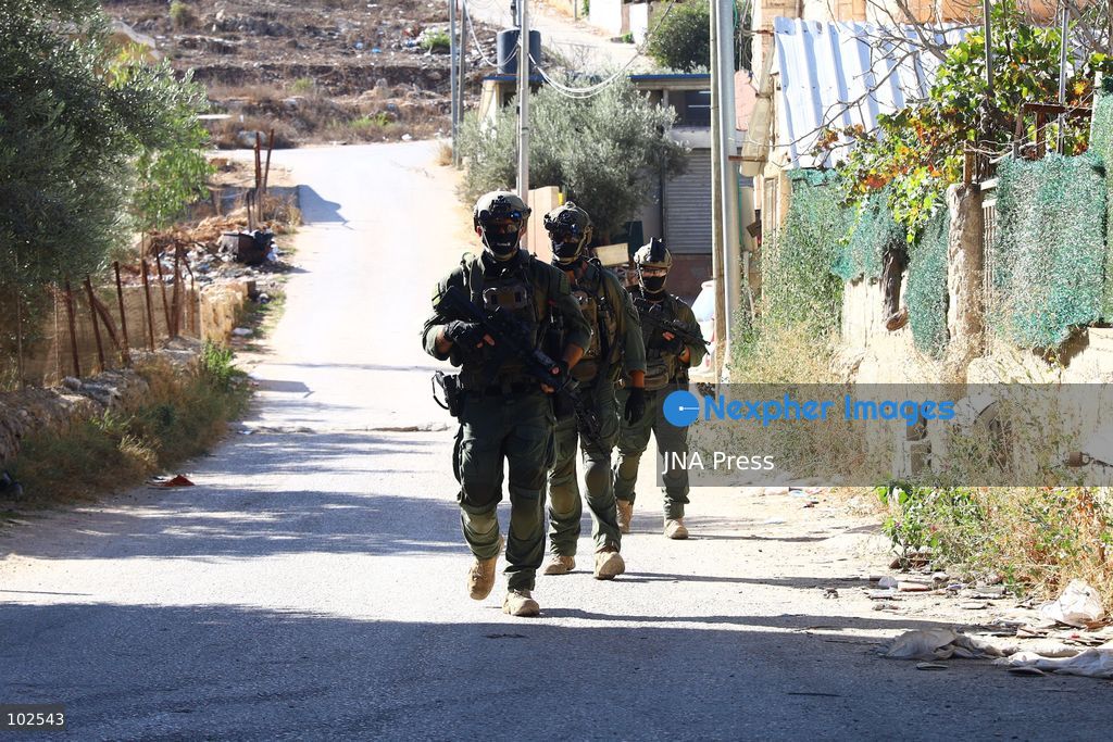 QATANNA, OCCUPIED WEST BANK, OCTOBER 7, 2026: Israeli forces carry out a military operation in the town of Qatanna, northwest of Jerusalem, raiding residential homes, detaining Palestinian residents and conducting field interrogations. Israeli forces also imposed a closure on the town, restricting movement in and out of the area. The operation in Qatanna formed part of a wider campaign across towns and villages northwest of Jerusalem, during which around 50 Palestinians were detained or arrested and dozens of homes were raided, according to Palestinian officials. Photo by Salman Mohsen Alkhatib / JNA Press. (Photo by Salman Mohsen Alkhatib/JNA Press via Nexpher Images)