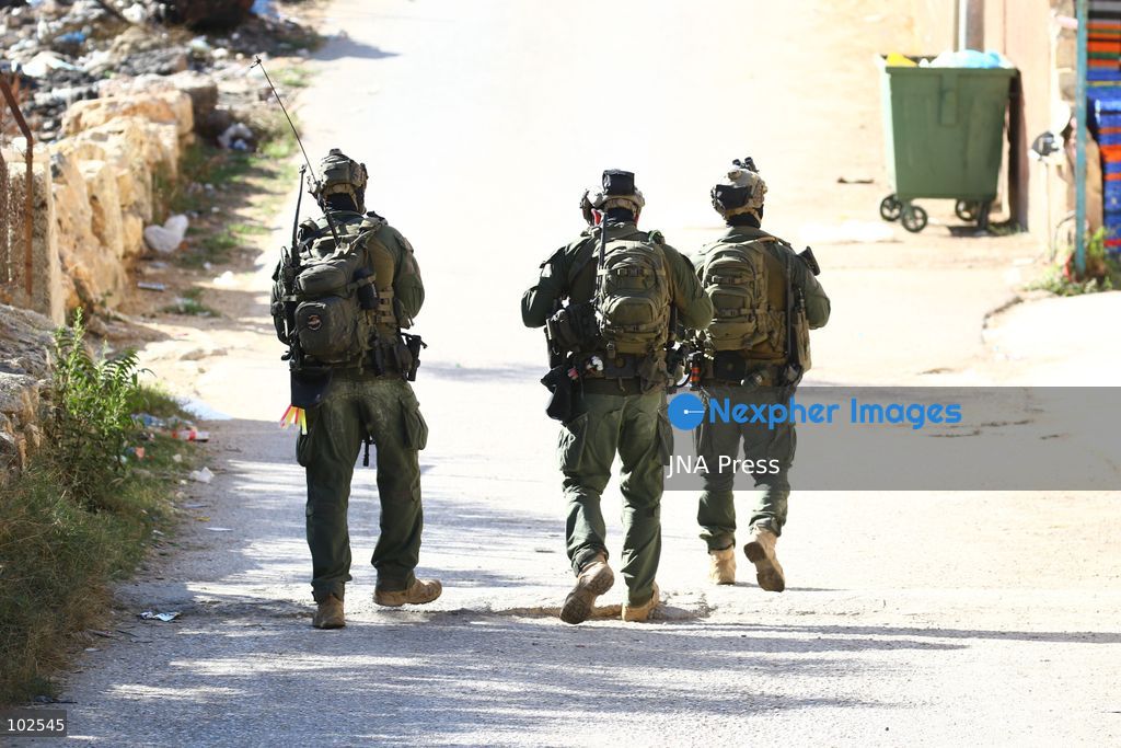 QATANNA, OCCUPIED WEST BANK, OCTOBER 7, 2026: Israeli forces carry out a military operation in the town of Qatanna, northwest of Jerusalem, raiding residential homes, detaining Palestinian residents and conducting field interrogations. Israeli forces also imposed a closure on the town, restricting movement in and out of the area. The operation in Qatanna formed part of a wider campaign across towns and villages northwest of Jerusalem, during which around 50 Palestinians were detained or arrested and dozens of homes were raided, according to Palestinian officials.  Photo by Salman Mohsen Alkhatib / JNA Press. (Photo by Salman Mohsen Alkhatib/JNA Press via Nexpher Images)