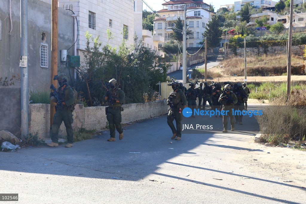 QATANNA, OCCUPIED WEST BANK, OCTOBER 7, 2026: Israeli forces carry out a military operation in the town of Qatanna, northwest of Jerusalem, raiding residential homes, detaining Palestinian residents and conducting field interrogations. Israeli forces also imposed a closure on the town, restricting movement in and out of the area. The operation in Qatanna formed part of a wider campaign across towns and villages northwest of Jerusalem, during which around 50 Palestinians were detained or arrested and dozens of homes were raided, according to Palestinian officials. Photo by Salman Mohsen Alkhatib / JNA Press. (Photo by Salman Mohsen Alkhatib/JNA Press via Nexpher Images)