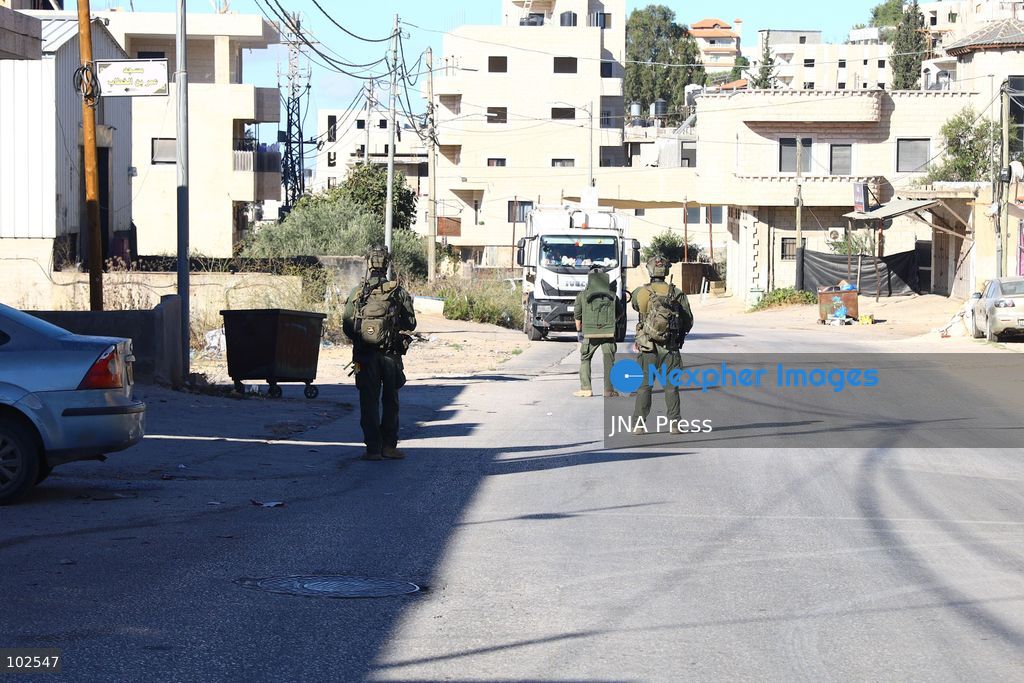QATANNA, OCCUPIED WEST BANK, OCTOBER 7, 2026: Israeli forces carry out a military operation in the town of Qatanna, northwest of Jerusalem, raiding residential homes, detaining Palestinian residents and conducting field interrogations. Israeli forces also imposed a closure on the town, restricting movement in and out of the area. The operation in Qatanna formed part of a wider campaign across towns and villages northwest of Jerusalem, during which around 50 Palestinians were detained or arrested and dozens of homes were raided, according to Palestinian officials. Photo by Salman Mohsen Alkhatib / JNA Press. (Photo by Salman Mohsen Alkhatib/JNA Press via Nexpher Images)