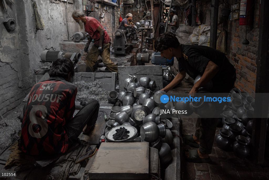 KERANIGANJ, DHAKA, BANGLADESH, OCTOBER 7, 2026: Young workers carry out manual tasks inside aluminum factories in the Zinjira industrial area of Keraniganj, near Dhaka. Sanaullah, believed to be around nine or 10 years old, says he works from 8 a.m. until 7 p.m. and earns about 1,400 Bangladeshi taka ($11) a month. Children are seen grinding and handling metal products inside workshops where workers are exposed to heat, smoke, metal dust, machinery and sharp equipment, with limited protective gear visible. The long working hours also leave little time for regular schooling. Photo by Bipul Ahmed / JNA Press. (Photo by Bipul Ahmed/JNA Press via Nexpher Images)