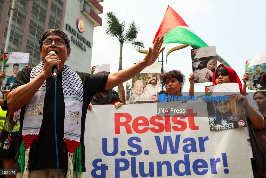 MANILA, PHILIPPINES, OCTOBER 7, 2026: Filipino activists rally near the United States Embassy in Manila in solidarity with Palestinians, marking three years since the October 7 attacks and the start of the Gaza war. Demonstrators condemned US military support for Israel and called for an end to the war in Gaza. Protesters also voiced opposition to the US-led Pax Silica initiative and the Luzon Economic Corridor, citing concerns over their potential impact on local communities, agricultural land and ancestral domains in the Philippines. Photo by Emman Capones / JNA PRESS (Photo by Emman Capones/JNA Press via Nexpher Images)