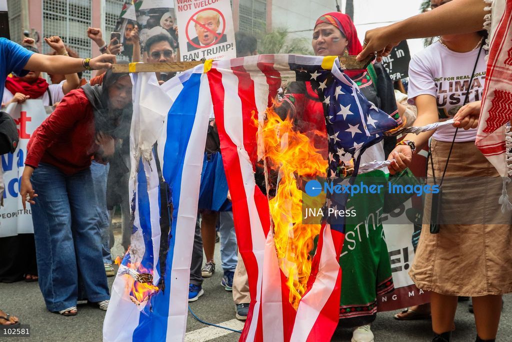 MANILA, PHILIPPINES, OCTOBER 7, 2026: Filipino activists rally near the United States Embassy in Manila in solidarity with Palestinians, marking three years since the October 7 attacks and the start of the Gaza war. Demonstrators condemned US military support for Israel and called for an end to the war in Gaza. Protesters also voiced opposition to the US-led Pax Silica initiative and the Luzon Economic Corridor, citing concerns over their potential impact on local communities, agricultural land and ancestral domains in the Philippines. Photo by Emman Capones / JNA PRESS (Photo by Emman Capones/JNA Press via Nexpher Images)