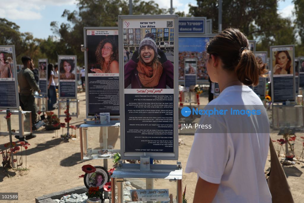 RE’IM, ISRAEL, OCTOBER 7, 2026: Israelis visit the Nova music festival memorial site near Re’im to mark the third anniversary of the October 7, 2023 attack. Visitors walk among memorials bearing the photographs and names of people killed at the festival site, where hundreds were killed during the Hamas-led attack three years earlier. Families, friends and members of the public gathered at the site to remember the victims and pay tribute to those killed. Photo by Saeed Qaq / JNA Press. (Photo by Saeed Qaq/JNA Press via Nexpher Images)