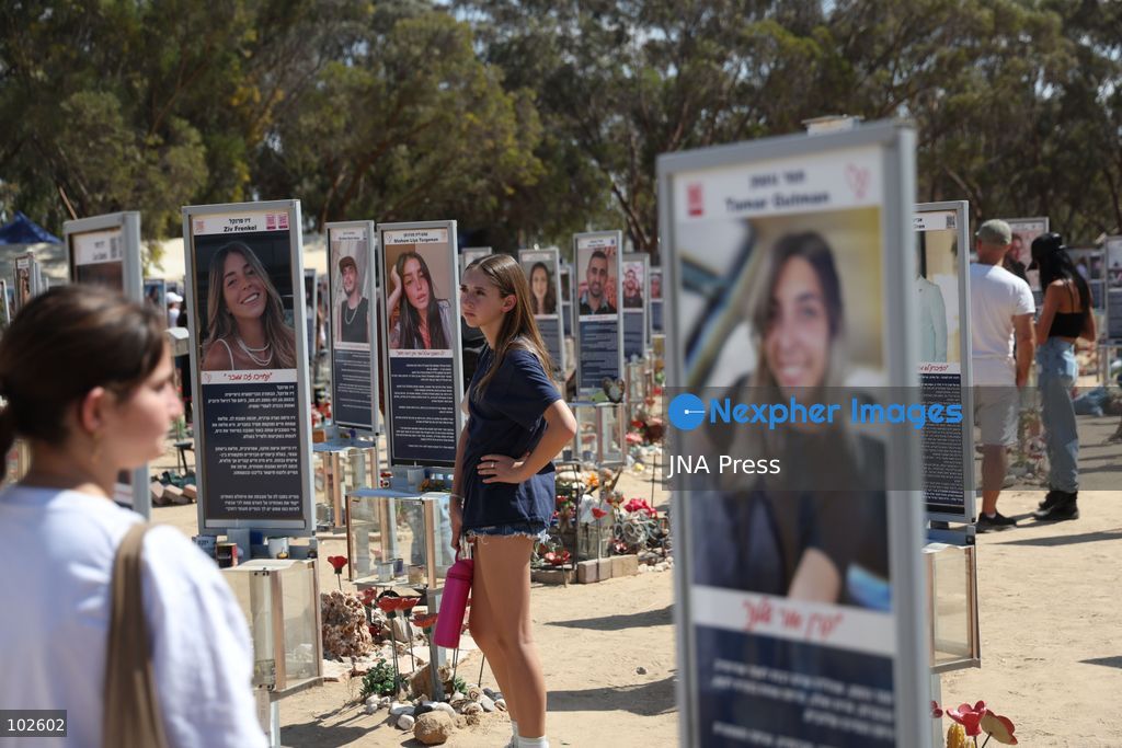 RE’IM, ISRAEL, OCTOBER 7, 2026: Israelis visit the Nova music festival memorial site near Re’im to mark the third anniversary of the October 7, 2023 attack. Visitors walk among memorials bearing the photographs and names of people killed at the festival site, where hundreds were killed during the Hamas-led attack three years earlier. Families, friends and members of the public gathered at the site to remember the victims and pay tribute to those killed. Photo by Saeed Qaq / JNA Press. (Photo by Saeed Qaq/JNA Press via Nexpher Images)