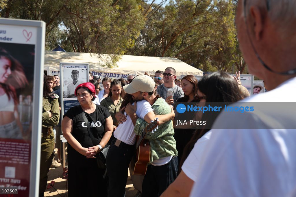 RE’IM, ISRAEL, OCTOBER 7, 2026: Israelis visit the Nova music festival memorial site near Re’im to mark the third anniversary of the October 7, 2023 attack. Visitors walk among memorials bearing the photographs and names of people killed at the festival site, where hundreds were killed during the Hamas-led attack three years earlier. Families, friends and members of the public gathered at the site to remember the victims and pay tribute to those killed. Photo by Saeed Qaq / JNA Press. (Photo by Saeed Qaq/JNA Press via Nexpher Images)