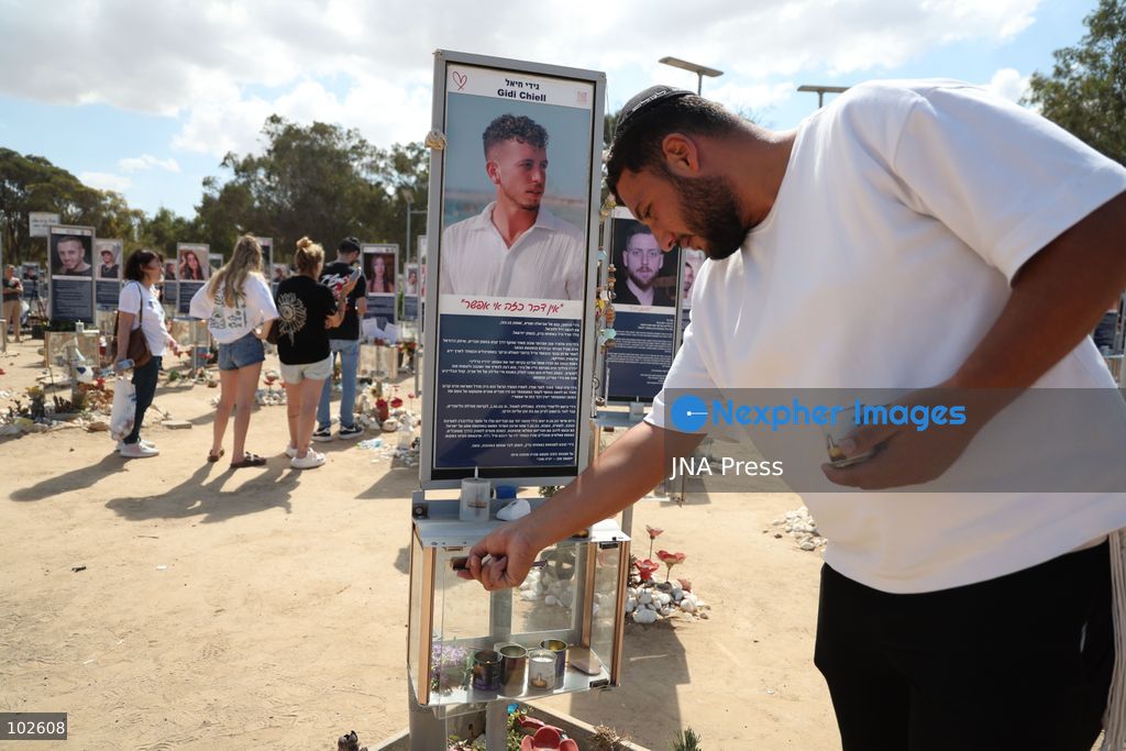 RE’IM, ISRAEL, OCTOBER 7, 2026: Israelis visit the Nova music festival memorial site near Re’im to mark the third anniversary of the October 7, 2023 attack. Visitors walk among memorials bearing the photographs and names of people killed at the festival site, where hundreds were killed during the Hamas-led attack three years earlier. Families, friends and members of the public gathered at the site to remember the victims and pay tribute to those killed. Photo by Saeed Qaq / JNA Press. (Photo by Saeed Qaq/JNA Press via Nexpher Images)