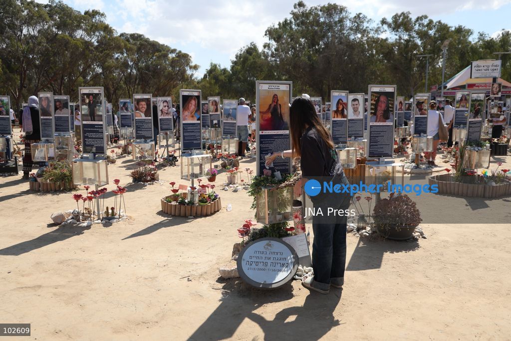 RE’IM, ISRAEL, OCTOBER 7, 2026: Israelis visit the Nova music festival memorial site near Re’im to mark the third anniversary of the October 7, 2023 attack. Visitors walk among memorials bearing the photographs and names of people killed at the festival site, where hundreds were killed during the Hamas-led attack three years earlier. Families, friends and members of the public gathered at the site to remember the victims and pay tribute to those killed. Photo by Saeed Qaq / JNA Press. (Photo by Saeed Qaq/JNA Press via Nexpher Images)