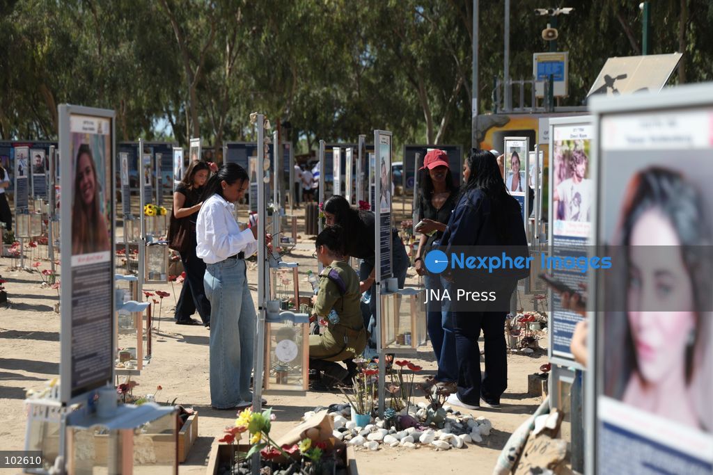 RE’IM, ISRAEL, OCTOBER 7, 2026: Israelis visit the Nova music festival memorial site near Re’im to mark the third anniversary of the October 7, 2023 attack. Visitors walk among memorials bearing the photographs and names of people killed at the festival site, where hundreds were killed during the Hamas-led attack three years earlier. Families, friends and members of the public gathered at the site to remember the victims and pay tribute to those killed. Photo by Saeed Qaq / JNA Press. (Photo by Saeed Qaq/JNA Press via Nexpher Images)