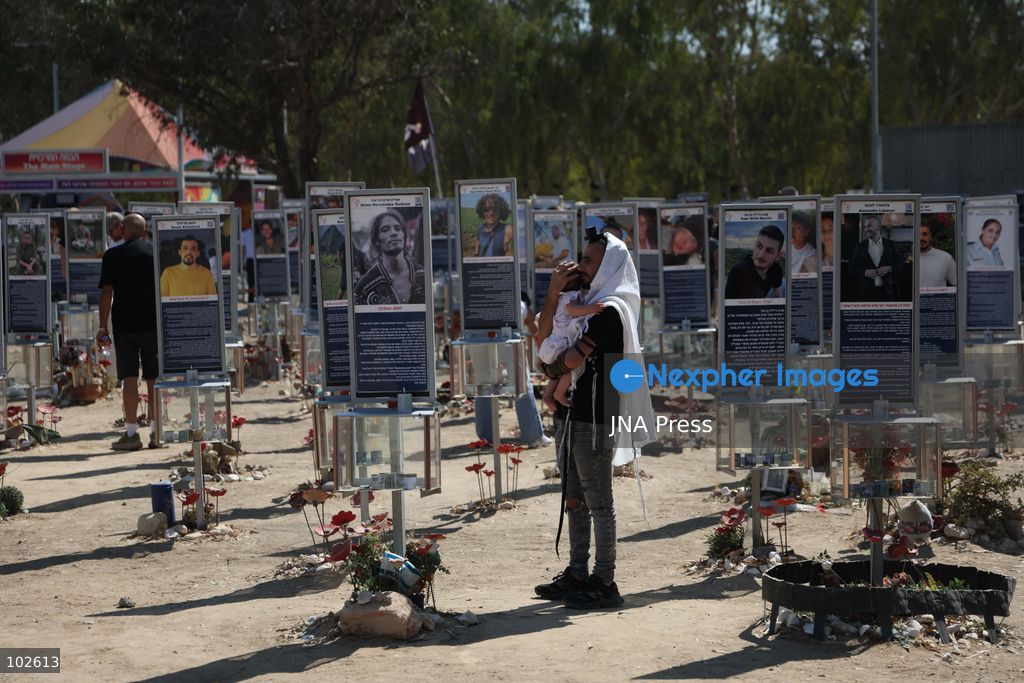 RE’IM, ISRAEL, OCTOBER 7, 2026: Israelis visit the Nova music festival memorial site near Re’im to mark the third anniversary of the October 7, 2023 attack. Visitors walk among memorials bearing the photographs and names of people killed at the festival site, where hundreds were killed during the Hamas-led attack three years earlier. Families, friends and members of the public gathered at the site to remember the victims and pay tribute to those killed. Photo by Saeed Qaq / JNA Press. (Photo by Saeed Qaq/JNA Press via Nexpher Images)