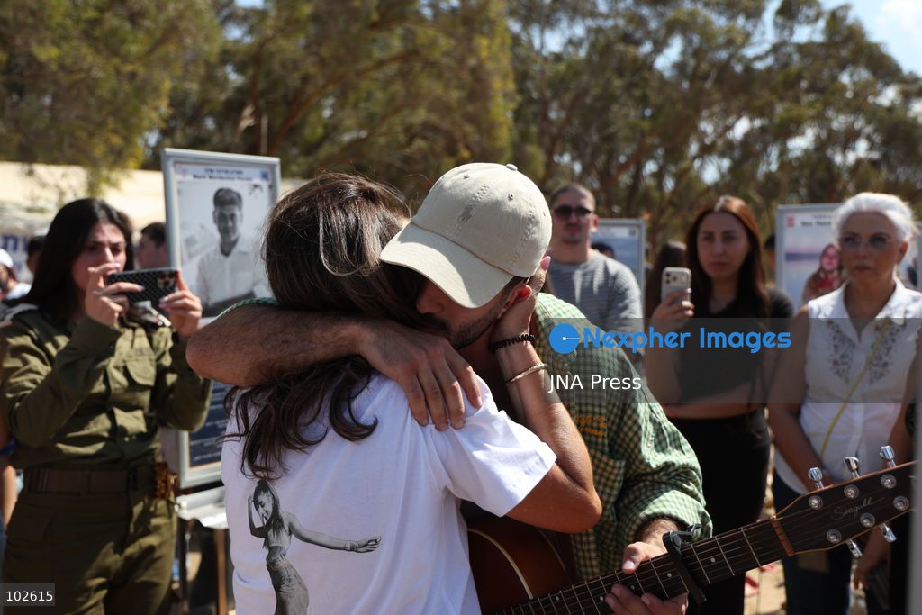 RE’IM, ISRAEL, OCTOBER 7, 2026: Israelis visit the Nova music festival memorial site near Re’im to mark the third anniversary of the October 7, 2023 attack. Visitors walk among memorials bearing the photographs and names of people killed at the festival site, where hundreds were killed during the Hamas-led attack three years earlier. Families, friends and members of the public gathered at the site to remember the victims and pay tribute to those killed. Photo by Saeed Qaq / JNA Press. (Photo by Saeed Qaq/JNA Press via Nexpher Images)