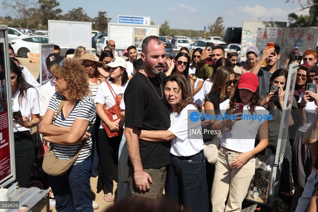 RE’IM, ISRAEL, OCTOBER 7, 2026: Israelis visit the Nova music festival memorial site near Re’im to mark the third anniversary of the October 7, 2023 attack. Visitors walk among memorials bearing the photographs and names of people killed at the festival site, where hundreds were killed during the Hamas-led attack three years earlier. Families, friends and members of the public gathered at the site to remember the victims and pay tribute to those killed. Photo by Saeed Qaq / JNA Press. (Photo by Saeed Qaq/JNA Press via Nexpher Images)
