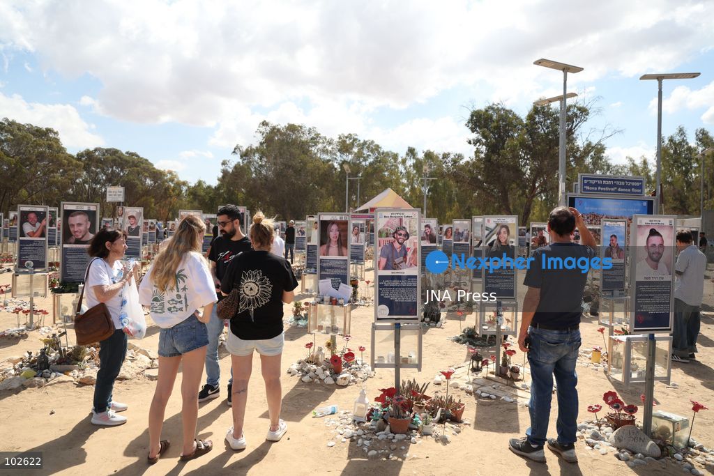 RE’IM, ISRAEL, OCTOBER 7, 2026: Israelis visit the Nova music festival memorial site near Re’im to mark the third anniversary of the October 7, 2023 attack. Visitors walk among memorials bearing the photographs and names of people killed at the festival site, where hundreds were killed during the Hamas-led attack three years earlier. Families, friends and members of the public gathered at the site to remember the victims and pay tribute to those killed. Photo by Saeed Qaq / JNA Press. (Photo by Saeed Qaq/JNA Press via Nexpher Images)