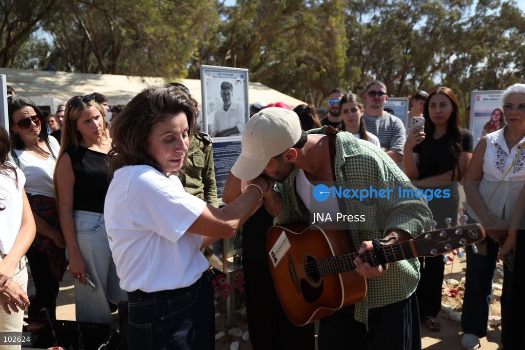 RE’IM, ISRAEL, OCTOBER 7, 2026: Israelis visit the Nova music festival memorial site near Re’im to mark the third anniversary of the October 7, 2023 attack. Visitors walk among memorials bearing the photographs and names of people killed at the festival site, where hundreds were killed during the Hamas-led attack three years earlier. Families, friends and members of the public gathered at the site to remember the victims and pay tribute to those killed. Photo by Saeed Qaq / JNA Press. (Photo by Saeed Qaq/JNA Press via Nexpher Images)