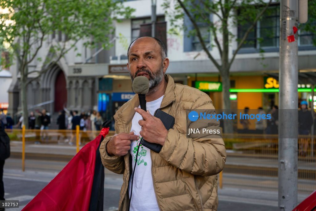 MELBOURNE, AUSTRALIA – OCTOBER 7, 2026: A day-long vigil in solidarity with the people of Gaza was held at the State Library of Victoria, with attendees taking part in a sit-in from 10:00 AM to 5:00 PM, followed by a commemoration from 5:00 PM to 6:00 PM to honour and remember people killed in Gaza. During the vigil, attendees made paper poppies and placed them throughout the garden in front of the library. A car marked with numerous bullet holes, presented as a representation of the vehicle in which Hind Rajab was trapped and killed in Gaza, was displayed at the site. A recording of Rajab's final call for help was also played over a speaker. The names and ages of people who had died were read aloud during the commemoration. Photo by Huda Shehzad / JNA Press. (Photo by Huda Shehzad/JNA Press via Nexpher Images)