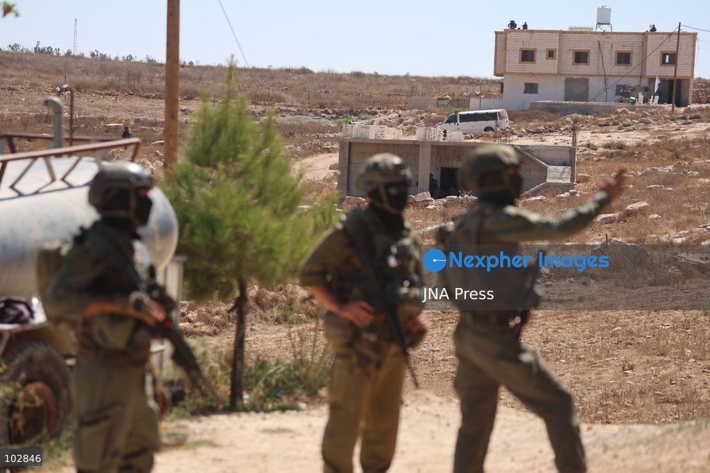 WADI AL-RAKHIM, YATTA, HEBRON, PALESTINE – OCTOBER 7, 2026: Israeli settlers continued to surround the home of Palestinian Yusuf Shnaran’s family in Wadi al-Rakhim, east of Yatta, south of Hebron, amid the presence of Israeli forces in the area since the previous night. According to the provided information, settlers had attacked the house and assaulted family members, injuring two of them. The situation continued on October 7 as settlers remained around the family home while Israeli forces were present in the area. Photo by Mosab Shawar / JNA Press. (Photo by Mosab shawer/JNA Press via Nexpher Images)