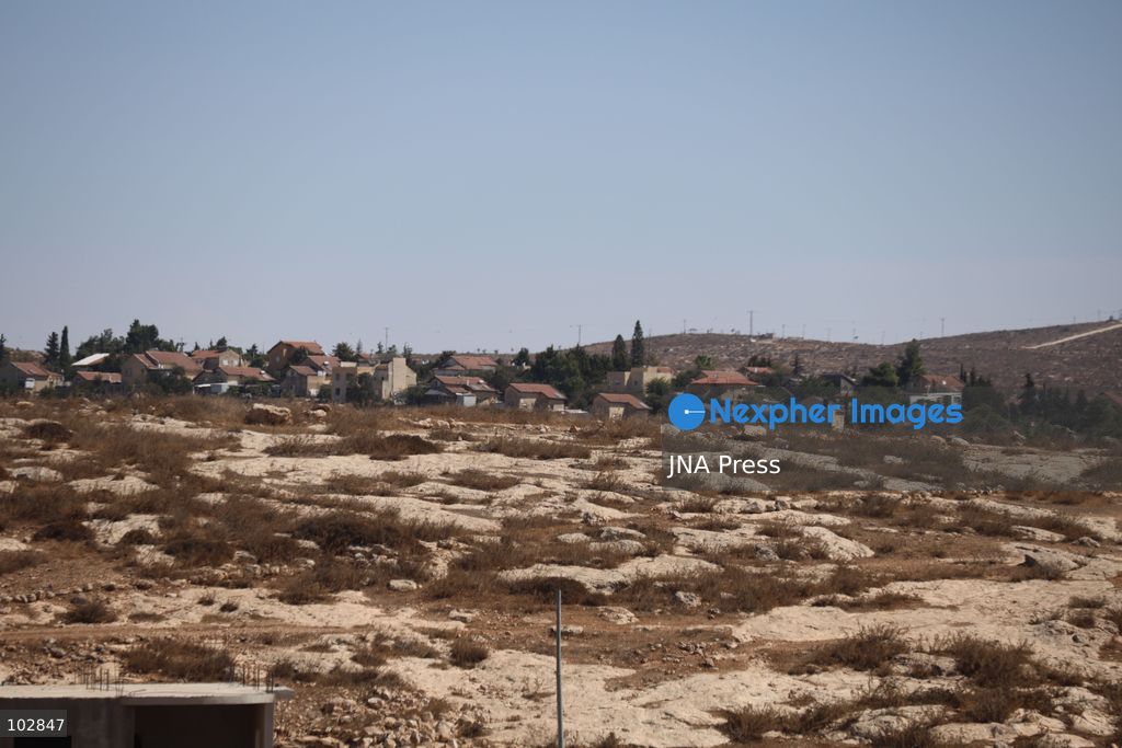 WADI AL-RAKHIM, YATTA, HEBRON, PALESTINE – OCTOBER 7, 2026: Israeli settlers continued to surround the home of Palestinian Yusuf Shnaran’s family in Wadi al-Rakhim, east of Yatta, south of Hebron, amid the presence of Israeli forces in the area since the previous night. According to the provided information, settlers had attacked the house and assaulted family members, injuring two of them. The situation continued on October 7 as settlers remained around the family home while Israeli forces were present in the area. Photo by Mosab Shawar / JNA Press. (Photo by Mosab shawer/JNA Press via Nexpher Images)