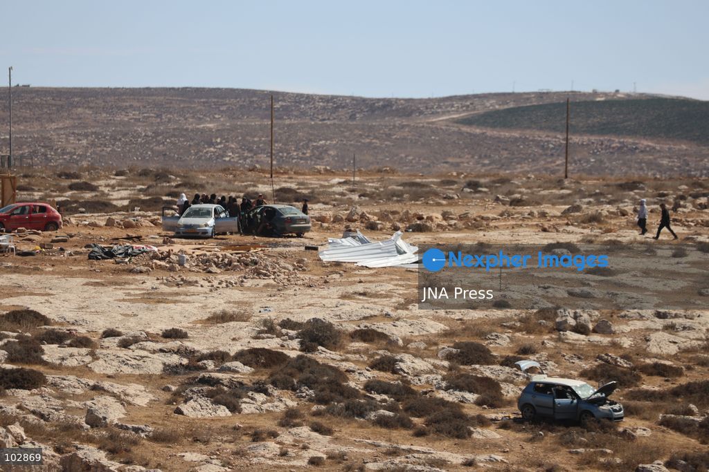 WADI AL-RAKHIM, YATTA, HEBRON, PALESTINE – OCTOBER 7, 2026: Israeli settlers continued to surround the home of Palestinian Yusuf Shnaran’s family in Wadi al-Rakhim, east of Yatta, south of Hebron, amid the presence of Israeli forces in the area since the previous night. According to the provided information, settlers had attacked the house and assaulted family members, injuring two of them. The situation continued on October 7 as settlers remained around the family home while Israeli forces were present in the area. Photo by Mosab Shawar / JNA Press. (Photo by Mosab shawer/JNA Press via Nexpher Images)