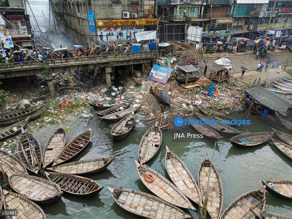 DHAKA, Bangladesh — Oct. 7, 2026: Discarded plastic, household refuse and other waste line sections of the Buriganga River and its waterways, including parts of its historic channel in Dhaka. The accumulation reflects a wider pollution problem affecting rivers and aquatic environments around the world. The Buriganga, an important waterway for Dhaka, receives waste from surrounding communities and industrial areas. Persistent plastic pollution has contributed to the degradation of the river and poses broader challenges for aquatic ecosystems, water quality and communities that depend on waterways. (Photo by Bipul Ahmed/JNA Press via Nexpher Images)