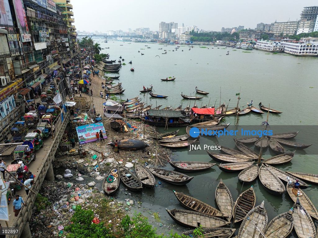 DHAKA, Bangladesh — Oct. 7, 2026: Discarded plastic, household refuse and other waste line sections of the Buriganga River and its waterways, including parts of its historic channel in Dhaka. The accumulation reflects a wider pollution problem affecting rivers and aquatic environments around the world. The Buriganga, an important waterway for Dhaka, receives waste from surrounding communities and industrial areas. Persistent plastic pollution has contributed to the degradation of the river and poses broader challenges for aquatic ecosystems, water quality and communities that depend on waterways. (Photo by Bipul Ahmed/JNA Press via Nexpher Images)