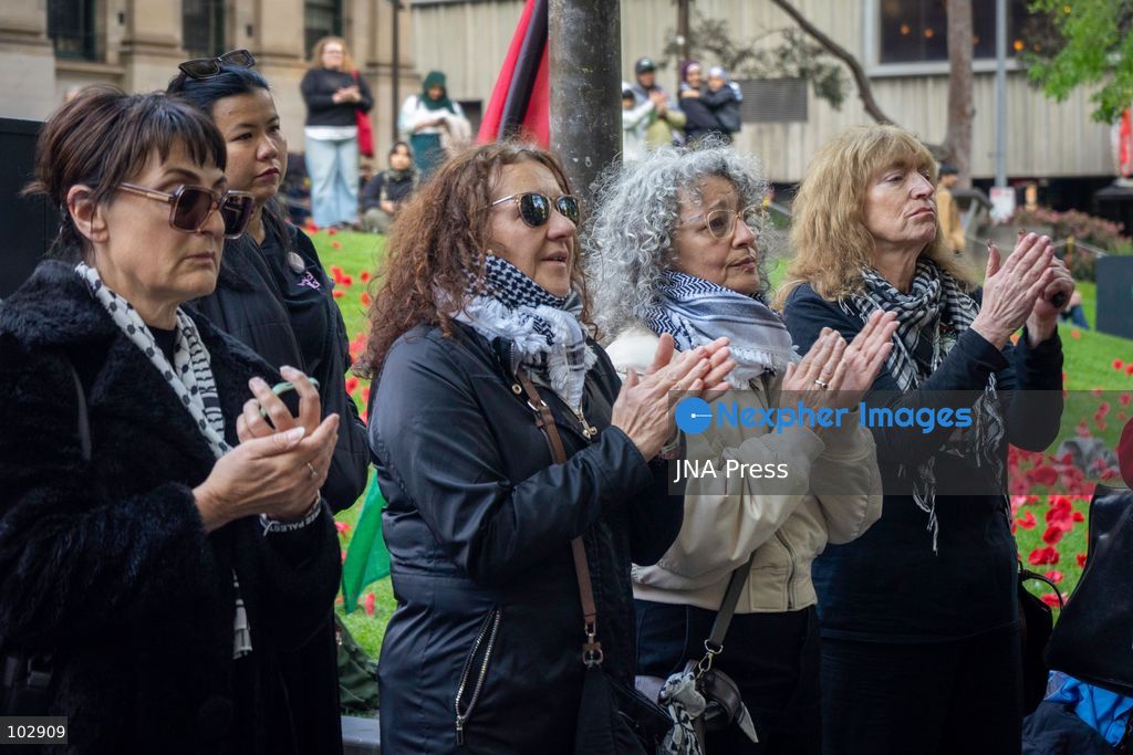 MELBOURNE, AUSTRALIA – OCTOBER 7, 2026: A day-long vigil in solidarity with the people of Gaza was held at the State Library of Victoria, with attendees taking part in a sit-in from 10:00 AM to 5:00 PM, followed by a commemoration from 5:00 PM to 6:00 PM to honour and remember people killed in Gaza. During the vigil, attendees made paper poppies and placed them throughout the garden in front of the library. A car marked with numerous bullet holes, presented as a representation of the vehicle in which Hind Rajab was trapped and killed in Gaza, was displayed at the site. A recording of Rajab's final call for help was also played over a speaker. The names and ages of people who had died were read aloud during the commemoration. Photo by Huda Shehzad / JNA Press. (Photo by Huda Shehzad/JNA Press via Nexpher Images)