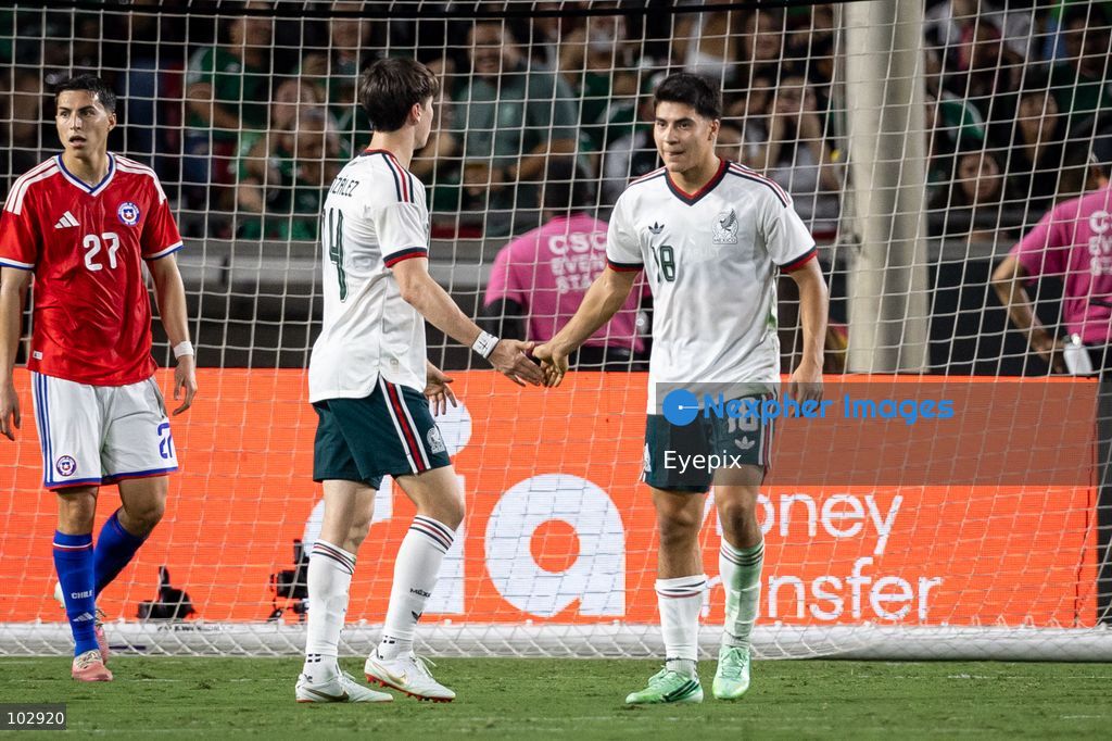 Obed Vargas #18 and Armando González #14 of Mexico national team greating during the International Friendly football match between Mexico and Chile at Los Angeles Memorial Coliseum on October 6, 2026 in Pasadena, California. (Photo by Arturo Cordero / Eyepix Group) (Photo by Arturo Cordero / Eyepix Group/Eyepix via Nexpher Images)