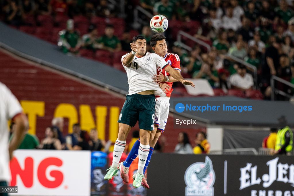 Germán Berterame #9 of Mexico national team and Jonathan Villagra #27 of Chile national team battle for the header during the International Friendly football match between Mexico and Chile at Los Angeles Memorial Coliseum on October 6, 2026 in Pasadena, California. (Photo by Arturo Cordero / Eyepix Group) (Photo by Arturo Cordero / Eyepix Group/Eyepix via Nexpher Images)