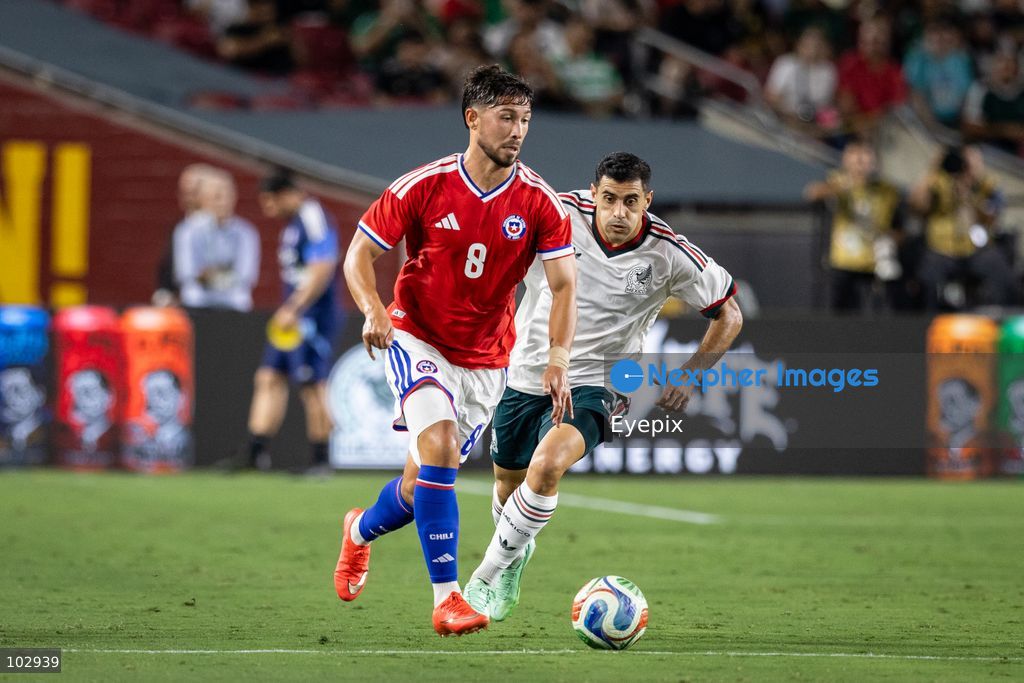 Felipe Loyola #8 of Chile national team runs with the ball during the International Friendly football match between Mexico and Chile at Los Angeles Memorial Coliseum on October 6, 2026 in Pasadena, California. (Photo by Arturo Cordero / Eyepix Group) (Photo by Arturo Cordero / Eyepix Group/Eyepix via Nexpher Images)