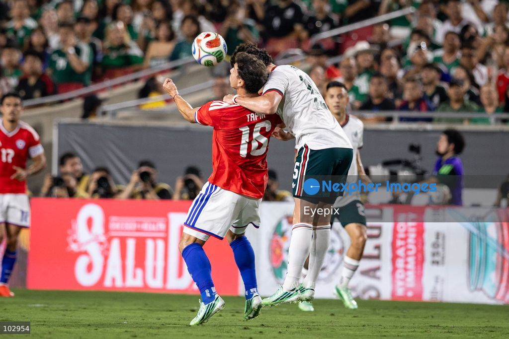 Gonzalo Tapia #16 of Chile national team is pressured by Israel Reyes #15 of Mexico national team during the International Friendly football match between Mexico and Chile at Los Angeles Memorial Coliseum on October 6, 2026 in Pasadena, California. (Photo by Arturo Cordero / Eyepix Group) (Photo by Arturo Cordero / Eyepix Group/Eyepix via Nexpher Images)