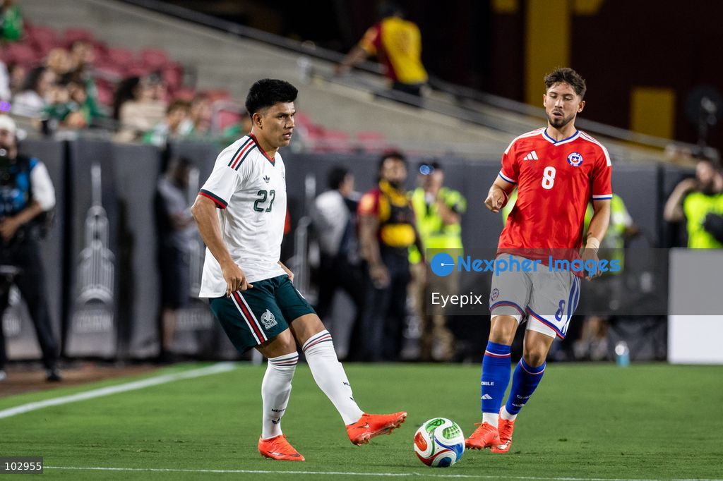 Jesus Gallardo #23 of Mexico national team passes the ball during the International Friendly football match between Mexico and Chile at Los Angeles Memorial Coliseum on October 6, 2026 in Pasadena, California. (Photo by Arturo Cordero / Eyepix Group) (Photo by Arturo Cordero / Eyepix Group/Eyepix via Nexpher Images)