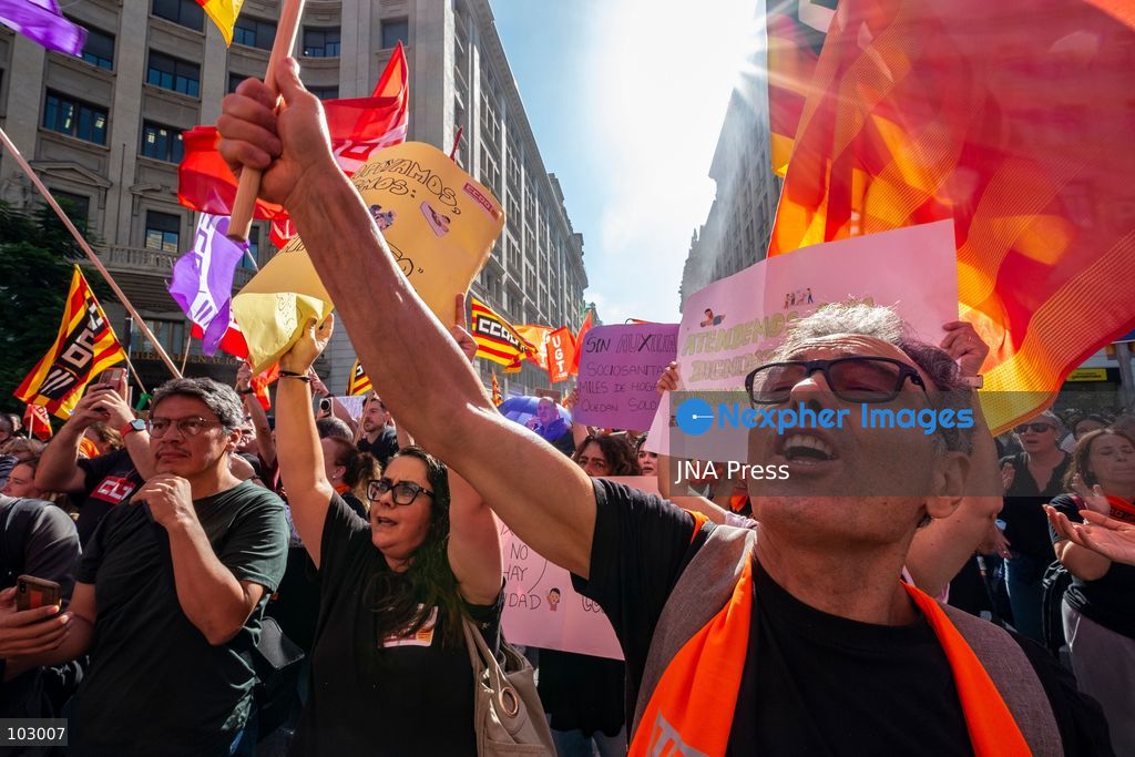 BARCELONA, SPAIN, OCTOBER 7, 2026: Social services workers march through Barcelona demanding improved working conditions, equal pay and a single collective bargaining agreement for the sector. The demonstration proceeded from Parc de la Ciutadella to the headquarters of Catalan employers' association Foment del Treball. Organizing unions say the sector, which provides services to around two million people, is currently covered by 17 separate collective agreements and faces precarious working conditions and stalled negotiations over their renewal. Photo by Miguel Galmes / JNA Press. (Photo by Miguel Galmés/JNA Press via Nexpher Images)